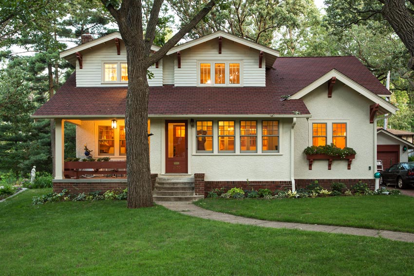 Baker Residence: A trio of gables surround an open porch